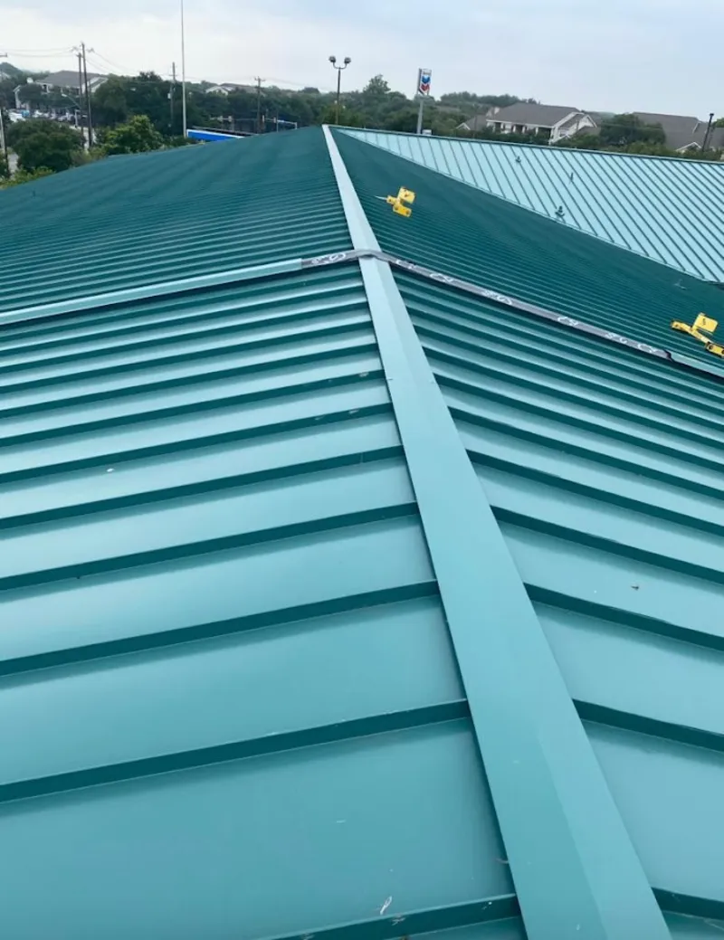 Green commercial metal roof ridge and valley for Metal Roof Repair in Foxborough