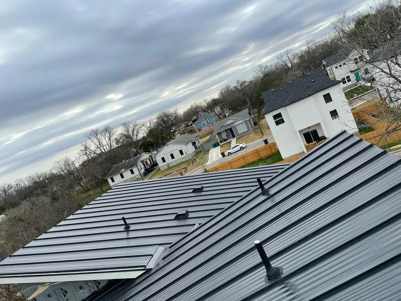 Standing seam metal roof panels with vents for Skylight Repair in Foxborough